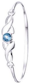 Silver bangle High polish Sterling Silver Blue topaz Celtic inset jewel